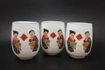 Chinese Tea Cups Of 3 Children Robes Front Porcelain. Fixed Price $17.85.