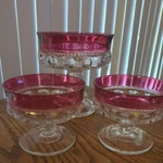 3 Vtg Clear Pressed Glass Red Trim Round Pedestal Ice Cream Candy Dessert Dishes. Fixed Price $30.00.