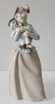Nao By Lladro' - "girl With Clown Doll" #1808 Porcelain Figurine Retired. Fixed Price $55.00.