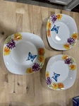 Set Of Four Gibson Everyday Floral And Butterfly Square Soup Salad Bowls. Fixed Price $9.49.