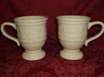 2 Chris Madden Adalina Light Yellow Coffee Mugs. Fixed Price $15.00.