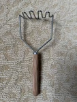 Williams Sonoma Olive Wood Potato Masher. Fixed Price $10.00.