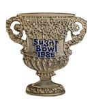 1986 Sugar Bowl Classic Silver Trophy Cup Pin Z24. Fixed Price $12.00.