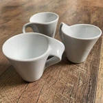 Stokes White Porcelain Set Of 3 Curved Handle Uneven Rim. Fixed Price $14.99.
