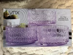 Lynx Stackable Four-piece Purple Glass Geometric Round Bowl Set. Fixed Price $20.00.