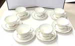 Rondo By Royal Doulton Set Of Six Cups And Saucers White With Gold Scroll Rims. Fixed Price $35.00.