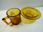 Tiara Amber Glass Humpty Dumpty Tom Pipers Nursery Rhyme Child Mug Bowl Set. Fixed Price $45.00.