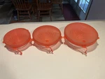 Pampered Chef Glass Nesting Mixing Set - 3 + Lids. Fixed Price $55.00.