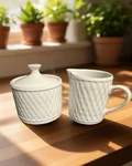 Oneida Wicker Cream & Sugar Bowl With Lid Stoneware. Fixed Price $29.00.