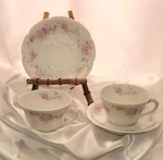2 Bassett Limoges Austria Teacups And Saucers Pink Flowers Scalloped. Fixed Price $28.00.