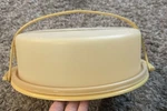 Vintage Tupperware Pie Keeper Carrier Harvest Gold Lid Handle 1256-3. Fixed Price $10.99.