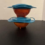 2 Baby Toddler Feeding Gyro Bowls Blue Orange 360 Degree Rotate Kids Spill-proof. Fixed Price $10.00.