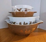 Pyrex Early American Cinderella Mixing Set 4 Gold Eagle Cat. Fixed Price $110.00.