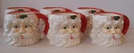 Six Santa Head Mugs With Holly By Marketplace, Made In Korea, Dishwasher Safe. Fixed Price $100.00.