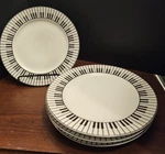 Lot Of (4) Aim Gift Piano Keys Dinner Plates 10 3/4". Fixed Price $32.99.