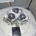 Michael Aram Silver Gold Metal Pomegranate Three-piece Decorative Bowl Set. Fixed Price $199.00.