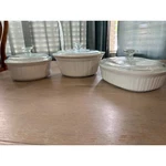 Corningware French White Casserole Dish Set 3 Piece Stoneware With Glass Lids. Fixed Price $44.00.