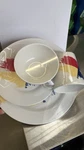 Encore Brandz Melamine 4-PIECE Dinner Set White Red Yellow Blue Plates Bowl. Fixed Price $25.00.