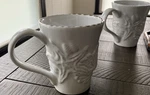 Mud Pie 16 Oz White Ceramic Coffee Mug Set 2, Embossed Coastal. Fixed Price $30.00.