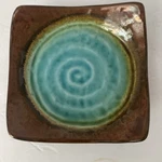 Artisan 6" Plate/bowl With Vibrant Aqua Spiral Design & Bronze Upturned Corners. Fixed Price $15.99.