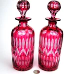 Pair 10 1/4" Red Ruby Cranberry Cut To Clear Glass Crystal Liquor Decanters. Fixed Price $285.00.